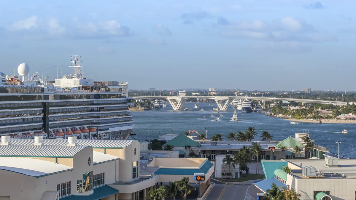 A cruise ship docked at Port Everglades — illustrative of the inventory wave-season pricing applies to.