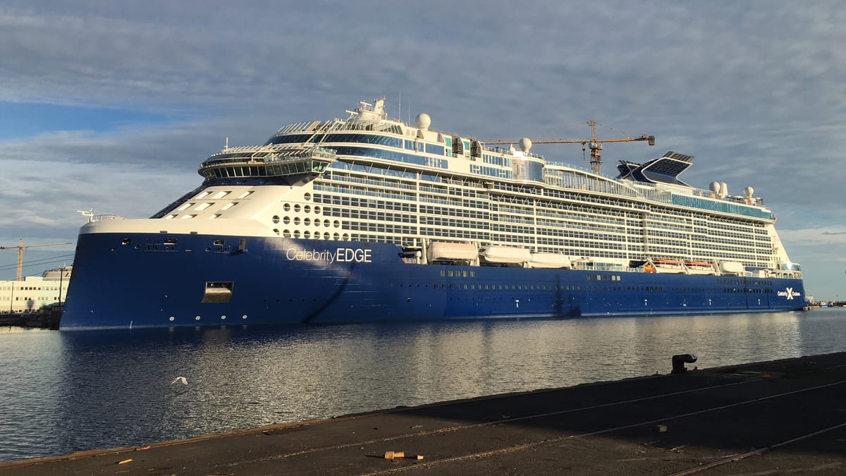 Celebrity Edge — the original ship in the class, with the cantilevered Magic Carpet visible to starboard.